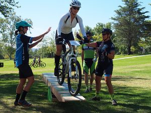 mountain biker on teeter totter